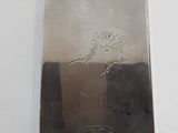 a silver flask with a picture of a deer on it