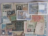 many different types of paper money on the table
