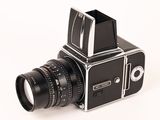 a black and white photo of a camera with a lens