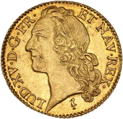 une pièce d'or à l'effigie d'une femme aux longs cheveux