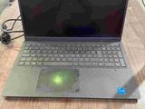 a laptop that is sitting on a table in a room