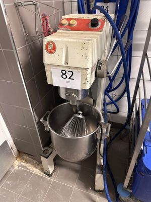 an image of a mixer in a kitchen with a blue bucket