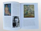 an open book with a picture of a man and a woman