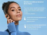 an image of a woman in a blue turtle neck sweater with her hand on her ear