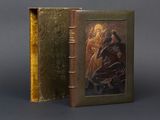 an old book with a picture of a man on a horse inside of it