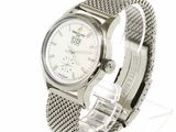 a close up of a wrist watch on a white background