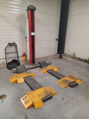 a garage with several pieces of equipment in it