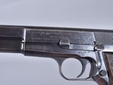 an old gun that is sitting on top of a table