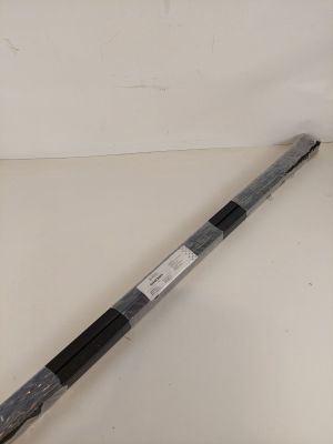 a large black and white object on a white surface