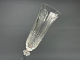 an image of a glass of wine on a table with a gray background