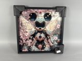 a close up of a picture of a mouse with wings on it