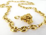 Ensemble collier et bracelet plaqués or, orné d'une pépite d'or suspendue à une chaîne