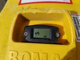 a close up of a radio in a yellow box