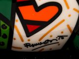 a close up of a cake with a heart on it
