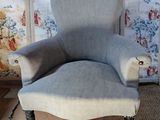 an image of a chair in a room with a wallpapered background