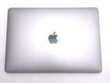 an apple logo on the back of an apple laptop