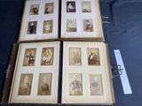 several old photos of people are displayed in a book