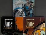 three books on a table one is a jane and the other is a halloween