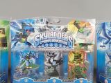 three toy figures of different types are shown on a gray surface