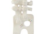 a white sculpture of a man holding a video game controller
