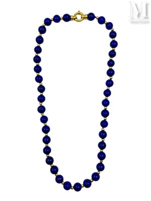 a blue beaded necklace with a gold plated clasp