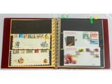 un livre ouvert avec des timbres sur une table