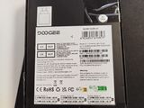 the back of a black box with a white sticker on it