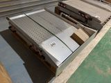 many boxes of metal on a pallet in a warehouse