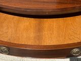 an image of a wooden desk with a drawer underneath it