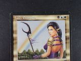 a card with a picture of a woman holding a scythe