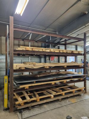 the pallets are stacked on top of each other in the warehouse