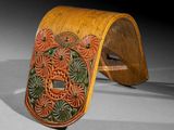 an image of a wooden cuff with a floral design on it