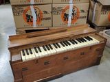 a piano that is sitting in the middle of a room