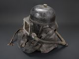 an image of a helmet with a gas mask on top of it