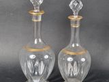 pair of antique cut glass decanters with gold trim