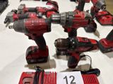 a lot of power tools that are on a table