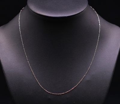 a silver chain necklace on a mannequin mannequin mannequin mannequin mannequin mannequin mannequin mannequin manne