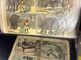 an old book with pictures of elephants on it