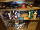 many items that are sitting on the shelves in the kitchen