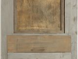 an image of a wooden door with a metal frame on it
