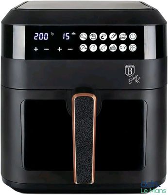 an image of a black air fryer sitting on top of a counter
