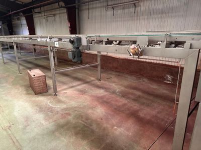 18 m linéaires de table de sortie en inox, sur chaine inox -…