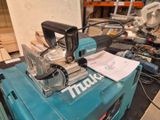 a blue machine that is sitting on top of a table