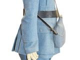 a figurine of a man dressed in a blue uniform