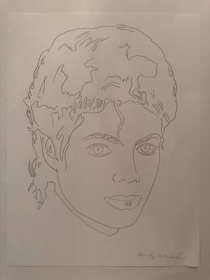 a drawing of a woman ' s face on a piece of paper