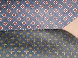 three ties that are stacked on top of each other