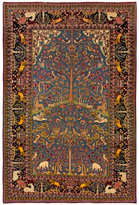 a blue and red rug with a tree of life on it