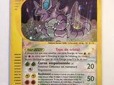 a close up of a pokemon card on a table