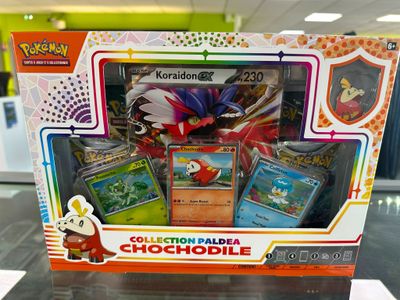une boîte contenant une collection de cartes pokémon