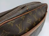 the inside of a louis vuitton bag on a white surface